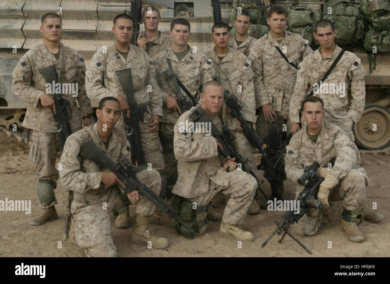 A squad of military personnel is pictured together, representing unit ...