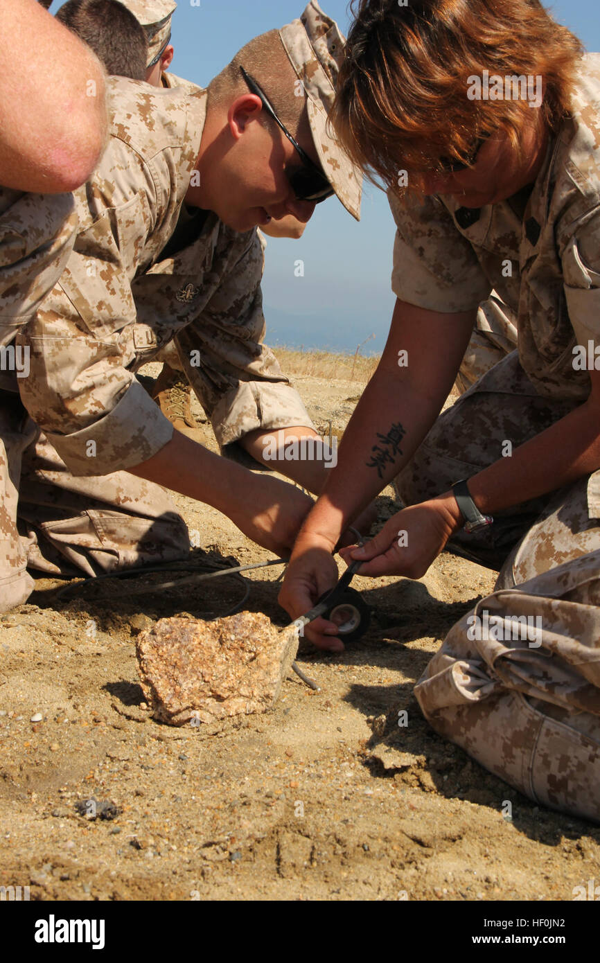 A U.S. Marine Explosive Ordnance Disposal (EOD) technician teaches U.S