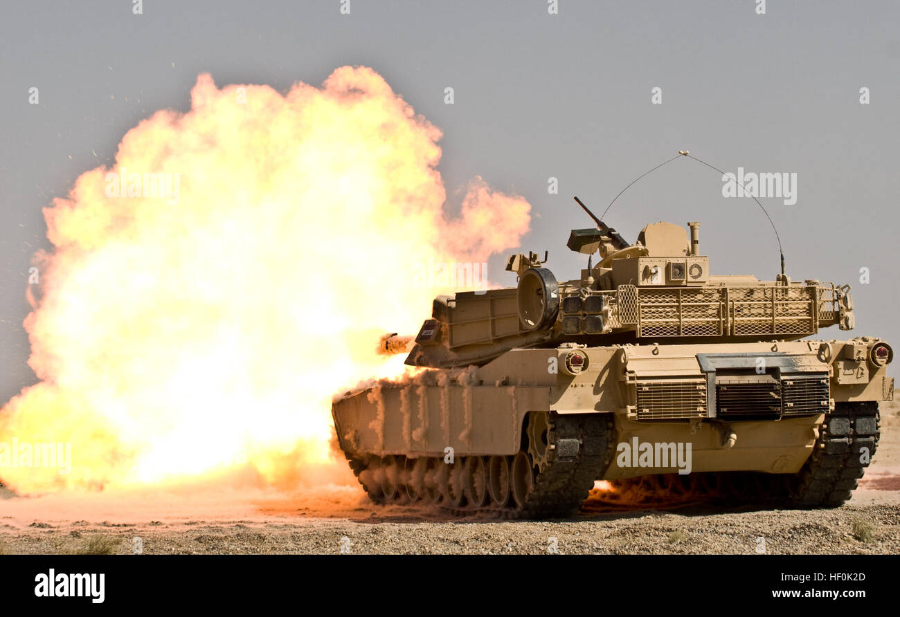 An Iraqi M1A1 Abrams tank belonging to 1st Company, 2nd Regiment, 34th Brigade, 9th Iraqi Army fires a shot downrange at the Besmaya Combat Training Center, Sept. 27 as part of the M1A1 Maneuver Collective Training Course. This armor company  is the first  to complete this training which focuses on movement techniques at the platoon level to increase crew competency. This company of tankers is the first company to participate in this specific course which focuses on movement techniques at the platoon level to increase crew competency. Flickr - DVIDSHUB - A new generation of tanker for a new ge Stock Photo