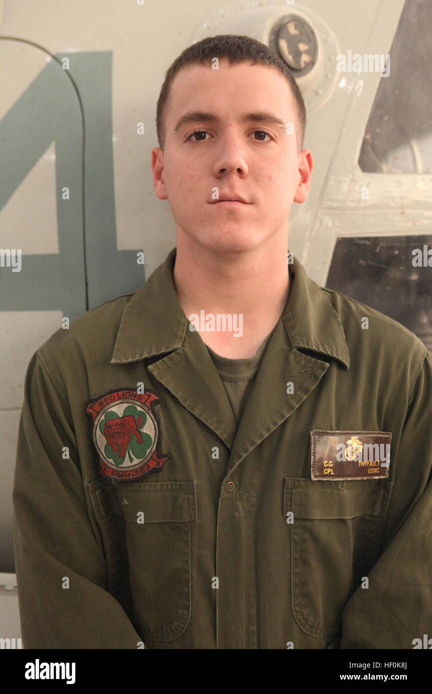 Cpl. Caleb Thyfault is a CH-53D Sea Stallion mechanic with Marine Heavy Helicopter Squadron 363. Thyfault, a native of Thornton, Colo., said he joined the military to see what he could do to make a positive difference for his family and country. HMH-363 Marines 111003-M-UB212-017 Stock Photo