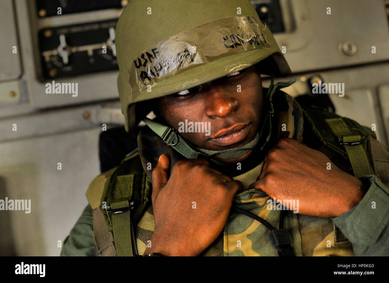 U.S. Air Force Senior Airman Raheem Crockett, C-17 Globemaster III Loadmaster, awaits further scenario instructions during an Operational Readiness Evaluation (ORE), Gulfport, Miss., October 28, 2011. Members of the 437th Airlift Wing, Joint Base Charleston, S.C., took part in the ORE, which was staged out of Gulfport. The ORE is intended to evaluate Joint Base Charleston's ability to 'take the fight to the enemy' and objectively measure mission effectiveness.  (U.S. Air Force Photo By: Staff Sgt. Clay Lancaster/Released) Flickr - DVIDSHUB - 437th AW Operational Readiness Evaluation (Image 8 o Stock Photo