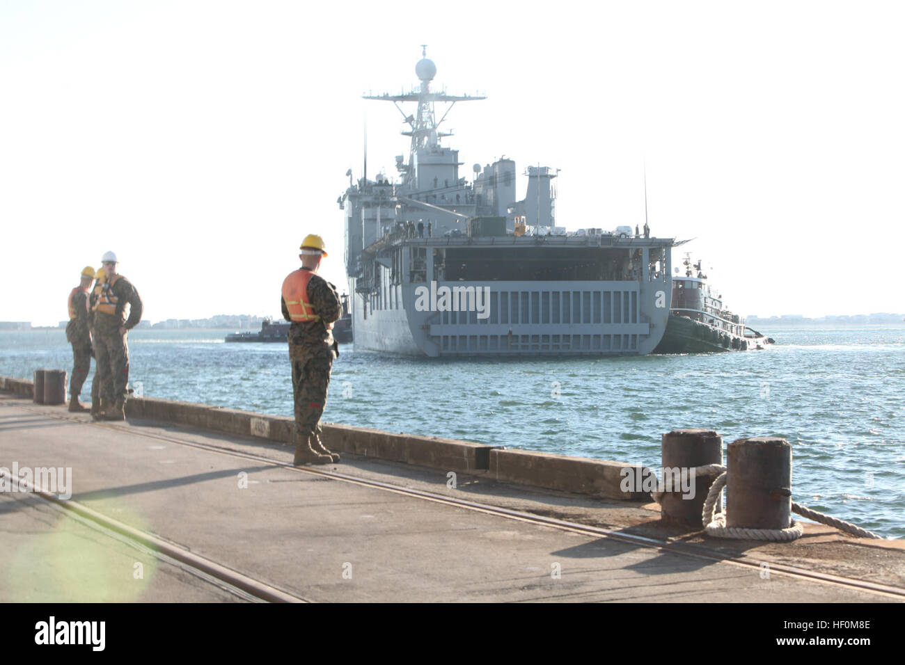 Marines wait at the Morehead City port while the USS Oak Hill carries