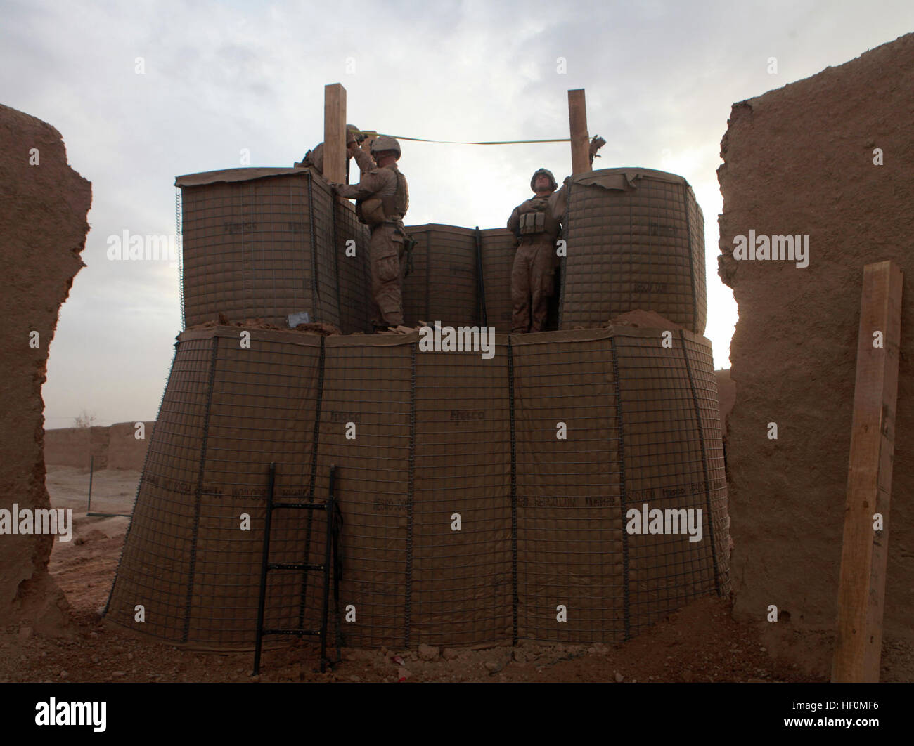Marines From 2nd Platoon Bravo Company 3rd Combat Engineer Battalion Build An Elevated Post During The Opening Phase Of Operation Double Check A Battalion Level Offensive To Rid Mosulmani And Other Areas Of