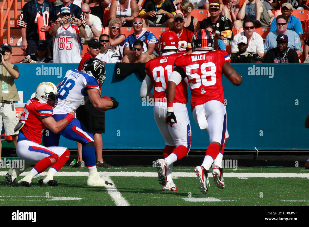 Atlanta Falcons tight end Tony Gonzalez is tackled by San Diego Chargers defensive safety Eric Weddle at the Aloha Stadium during National Football League's 2012 Pro Bowl game in Honolulu, Hawaii, Jan. 29, 2012. Pro Bowl 2012 120129-M-DX861-092 Stock Photo