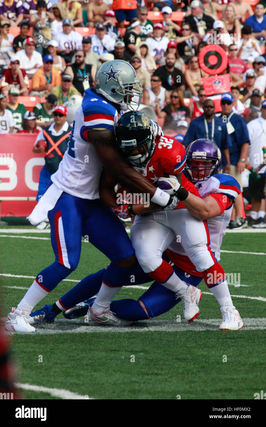 Jacksonville Jaguars running back Maurice Jones-Drew is tackled at the Aloha Stadium during the National Football League's 2012 Pro Bowl game in Honolulu, Hawaii, Jan. 29, 2012. Pro Bowl 2012 120129-M-DX861-121 Stock Photo