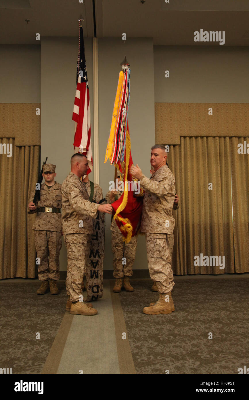 Maj. Gen. Glenn M. Walters, commanding general of the 2nd Marine Aircraft Wing (Forward), and Sgt. Maj. Henry A. Prutch case the colors of 2nd MAW (Fwd) during a ceremony aboard MCAS Cherry Point, N.C., March 16. 2nd MAW (Fwd) deactivates after year in Afghanistan 120316-M-AF823-159 Stock Photo