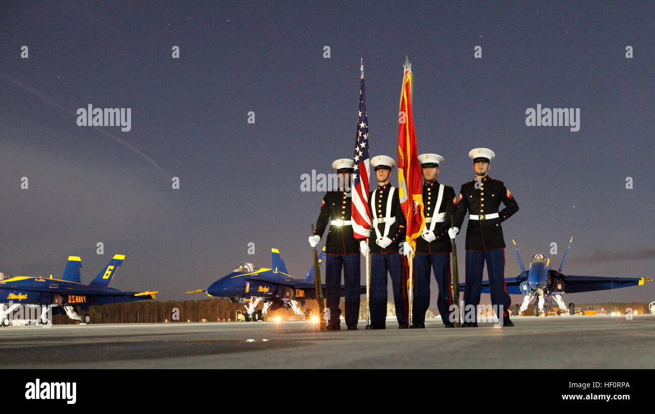 The Headquarters and Headquarters Squadron color guard stands in front of F/A-18 Hornets with the Blue Angels at the 2012 Marine Corps Air Station Cherry Point Air Show May 4. Because 2012 marked the 100th year of Marine Corps aviation, the air show's theme centered around celebrating the heritage and history of Marine aviation. Marine Corps Air Station Cherry Point Year In Review 120504-M-OT671-257 Stock Photo