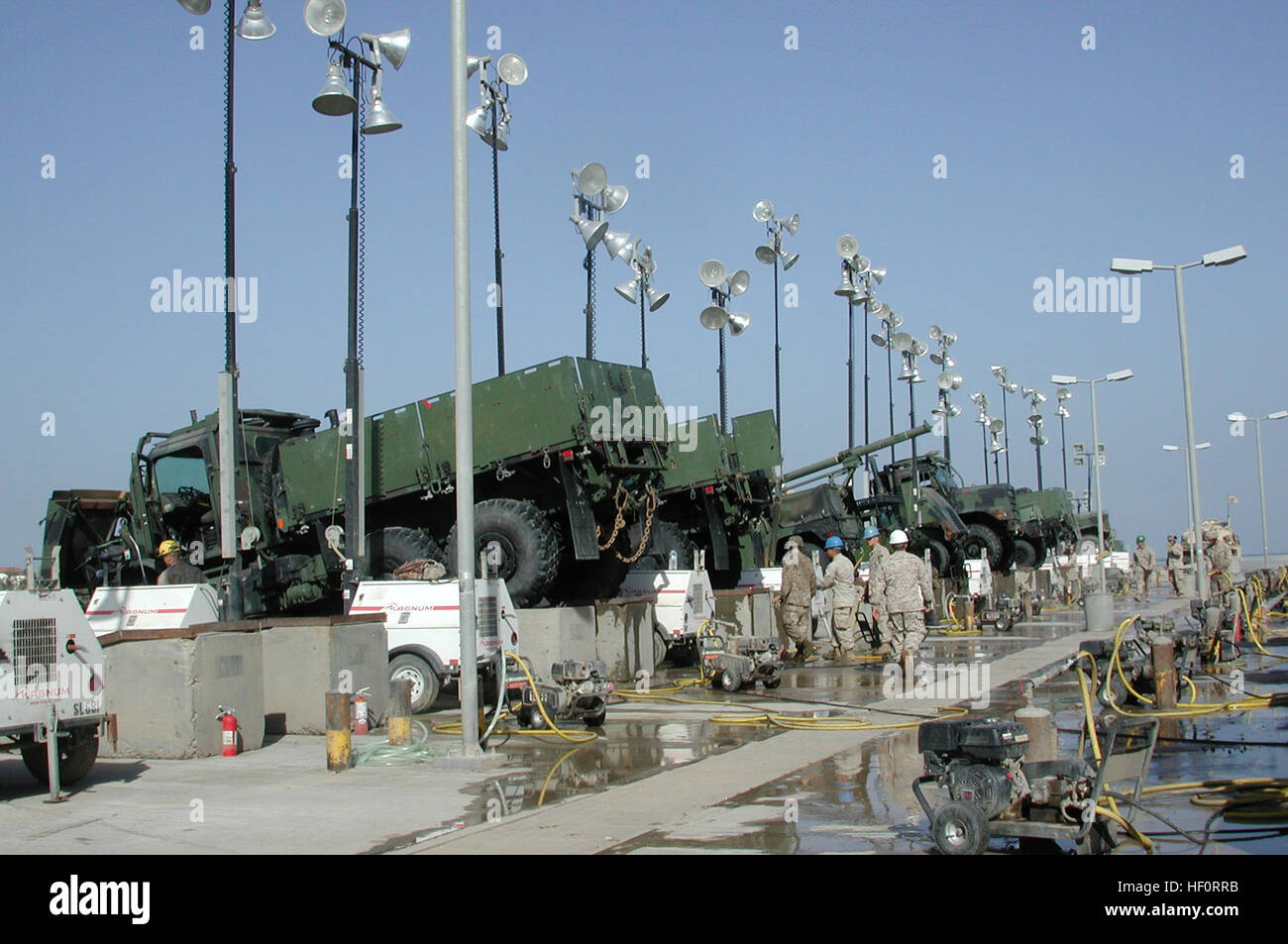 KUWAIT NAVAL BASE, Kuwait (April 5, 2005) A group of tactical vehicles sit staged during