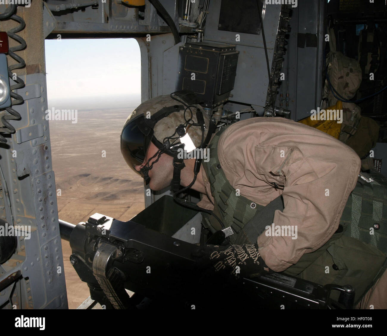A U.S. Marine Corps aerial observer from Marine Heavy Helicopter ...