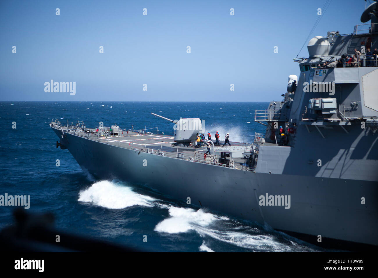 U.S. Naval Ship USS Harris floats by the USS Peleliu during a ship to