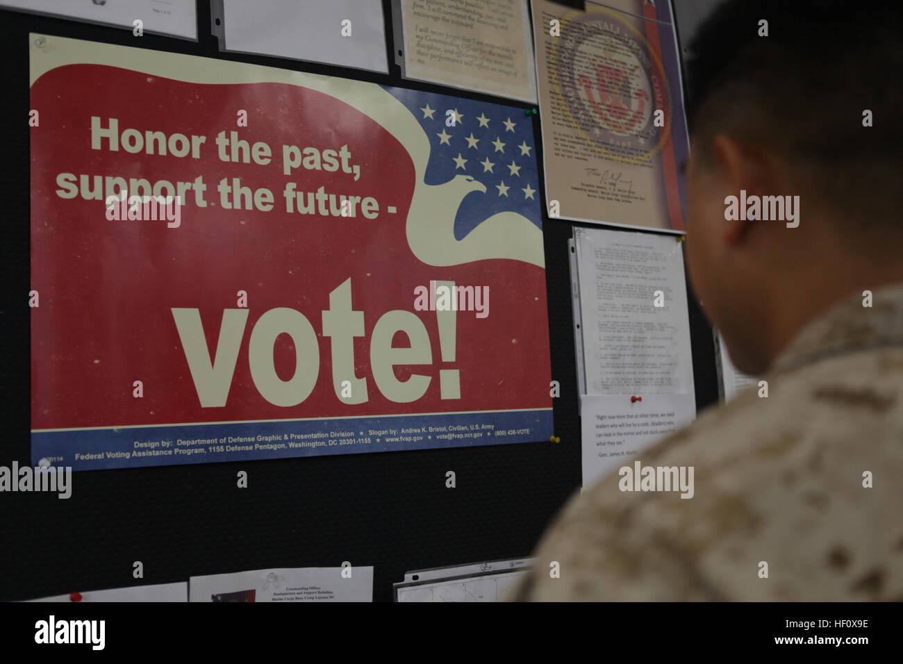 Posters encouraging Marines to engage the political systems they defend hang in various locations throughout Marine Corps Base Camp Lejeune. With their military lifestyles and professional requirements, Marines often find politics and profession to be a balancing act. While maximum participation in the electoral process is encouraged throughout the Marine Corps, the guidelines laid out in Department of Defense Directive 1344.10 are readily available to Marines walking the politics-profession tightrope as they perform their civic and military duties. Election season calls for caution, professio Stock Photo