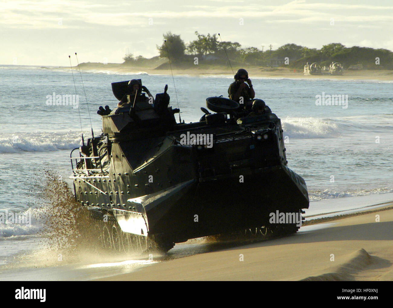050628-N-1397H-144 Kauai, Hawaii (June 28, 2005) - Marines assigned to the 3rd Amphibious Assault Battalion based out of Camp Pendleton, Calif., maneuver their Amphibious Assault Vehicles (AAVs) around the beach during a training exercise at the Pacific Missile Range Facility. U.S. Navy Photo by PhotographerÕs Mate 2nd Class Prince A. Hughes III (RELEASED) AAV-7A1 comes ashore Stock Photo