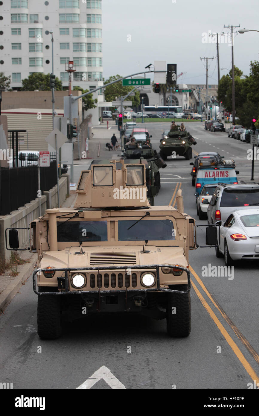 121004-M-OH054-165 SAN FRANCISCO – Marines with the 13th Marine Expeditionary Unit drive a convoy of humvees and Light Armored Vehicles through San Francisco to assist with static display preparation in Alameda near the USS Hornet, Oct. 4, 2012. The vehicles will be on display for the public to see during the 2012 San Francisco Fleet Week. From Oct. 3-8, Marines and Sailors of the 13th MEU, I Marine Expeditionary Brigade, will participate in numerous community outreach events including the Italian Heritage Day parade, urban search and rescue demonstration, park restoration projects and hospita Stock Photo