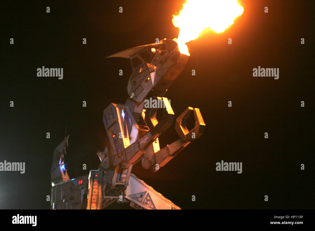 Robosaurus, the car crushing dinosaur robot, lights up the sky during