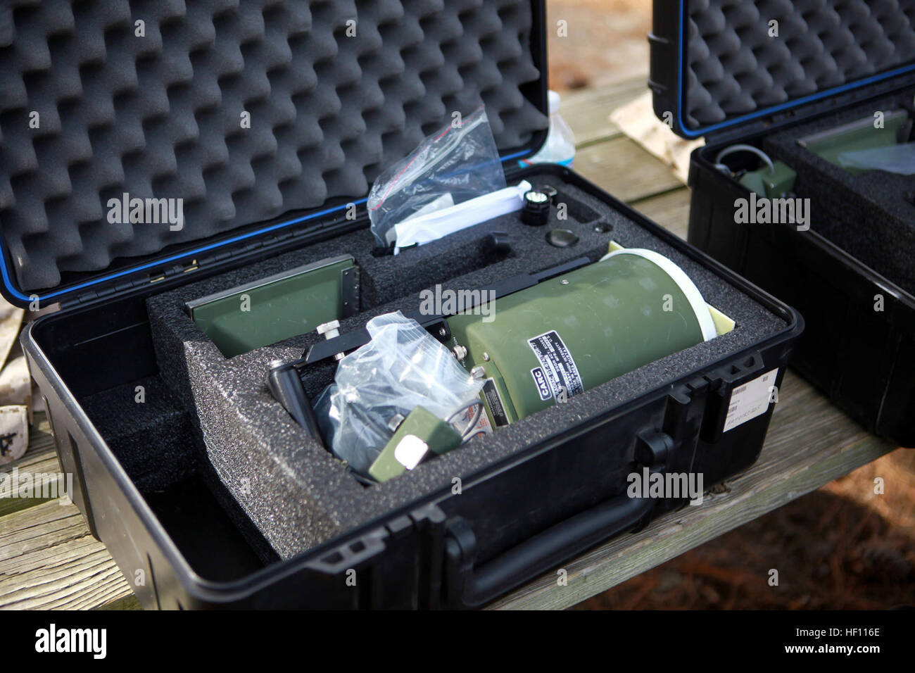 An AN/PDR-77, a device used to detect and measure radiation, sits Stock