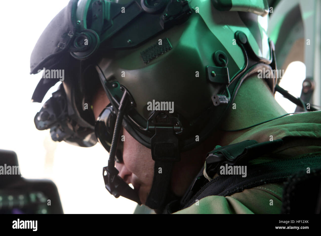 U.S. Marine Corps Maj. Patrick F. Lieneweg, UH-1Y Huey utility helicopter  pilot with Marine Light Attack Helicopter Squadron (HMLA) 169, Marine  Aircraft Group 39, 3rd Marine Aircraft Wing (Forward) prepares for flight, image size:1300x956