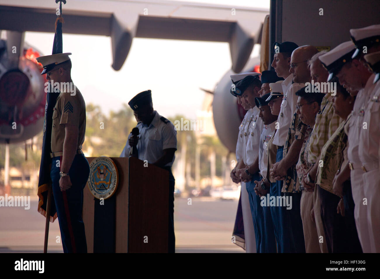 U.S. service members with Joint POW/MIA Accounting Command (JPAC) bow ...