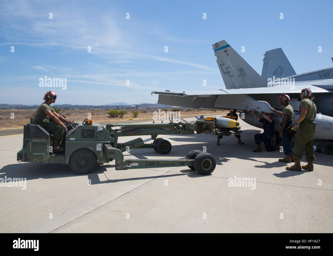 Marines from Marine All-Weather Fighter Attack Squadron 225 prepare and ...