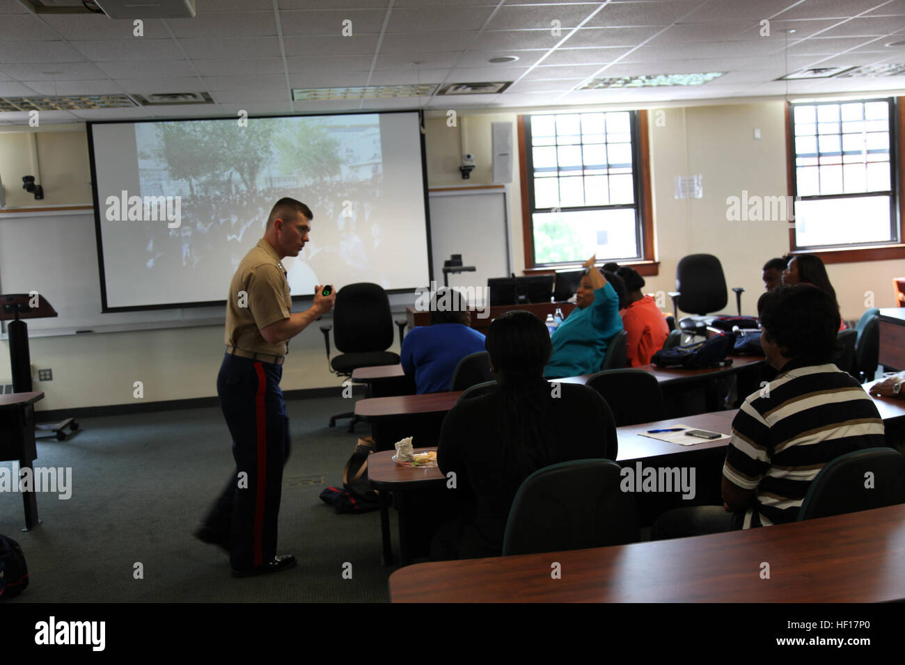Capt. Michael R. Schultz, an instructor with Officer Candidate School, Marine Corps Base Quantico, leads a guided discussion about ethical leadership with students of North Carolina Central University during the Marine Corps Leadership Seminar April 12. The objective of the MCLS is to showcase the tremendous leadership opportunities that the U.S. Marine Corps has to offer young college graduates. The seminar featured presentations by Marine instructors from Officer Candidate School and The Basic School, Marine Corps Base Quantico, on topics such as Marine Corps leadership traits, decision maki Stock Photo