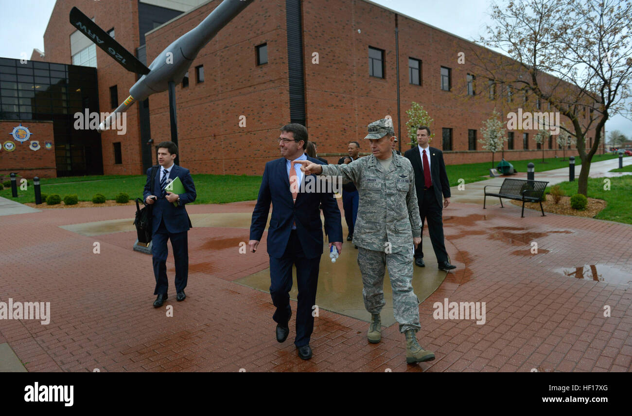 Deputy Secretary of Defense Ash Carter, left foreground, talks with U.S. Air Force Gen. William M. Fraser III, the commander of U.S. Transportation Command (USTRANSCOM), as they walk to a meeting at USTRANSCOM headquarters April 16, 2013, at Scott Air Force Base, Ill. (DoD photo by Glenn Fawcett/Released) Carter at Scott Air Force Base 130416-D-NI589-029 Stock Photo