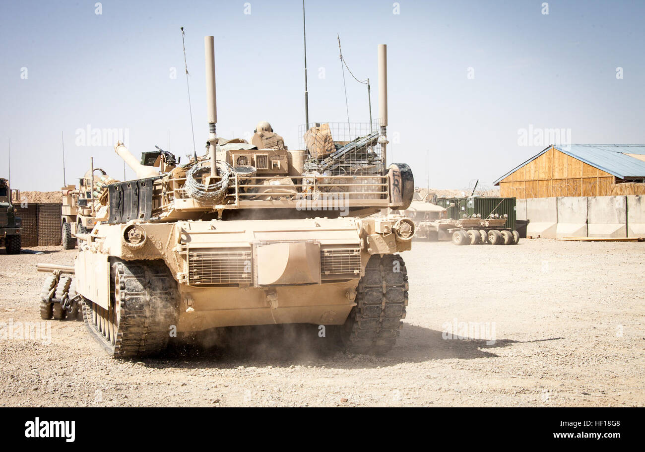 A U.S. Marine M1A1 Abrams tank with Delta Company, 1st Tank Battalion, Regimental Combat Team 7, (RCT) 7, rolls by on Camp Shir Ghazay, Helmand province, Afghanistan, April 27, 2013. Camp Shir Ghazay is home to the Marines and Sailors of Delta Company who deployed to Afghanistan in support of Operation Enduring Freedom. (U.S. Marine Corps photo by Staff Sgt. Ezekiel R. Kitandwe/Released) Delta Company tanks roll through Shir Ghazay 130427-M-RO295-070 Stock Photo