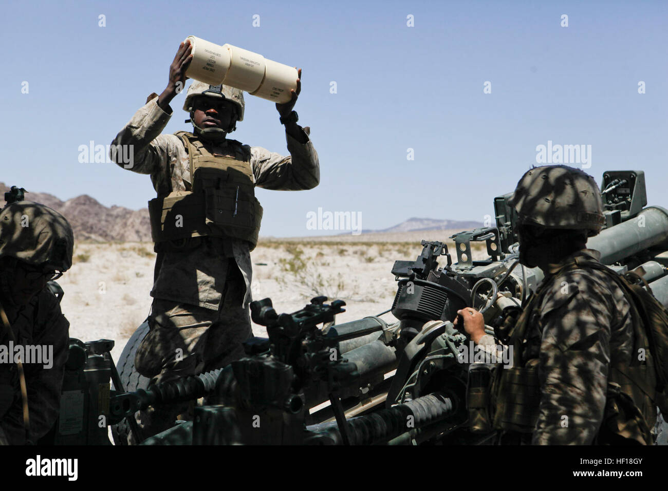 U.S. Marine Corps Lance Cpl. Andre Baxter, a field artillery cannoneer ...