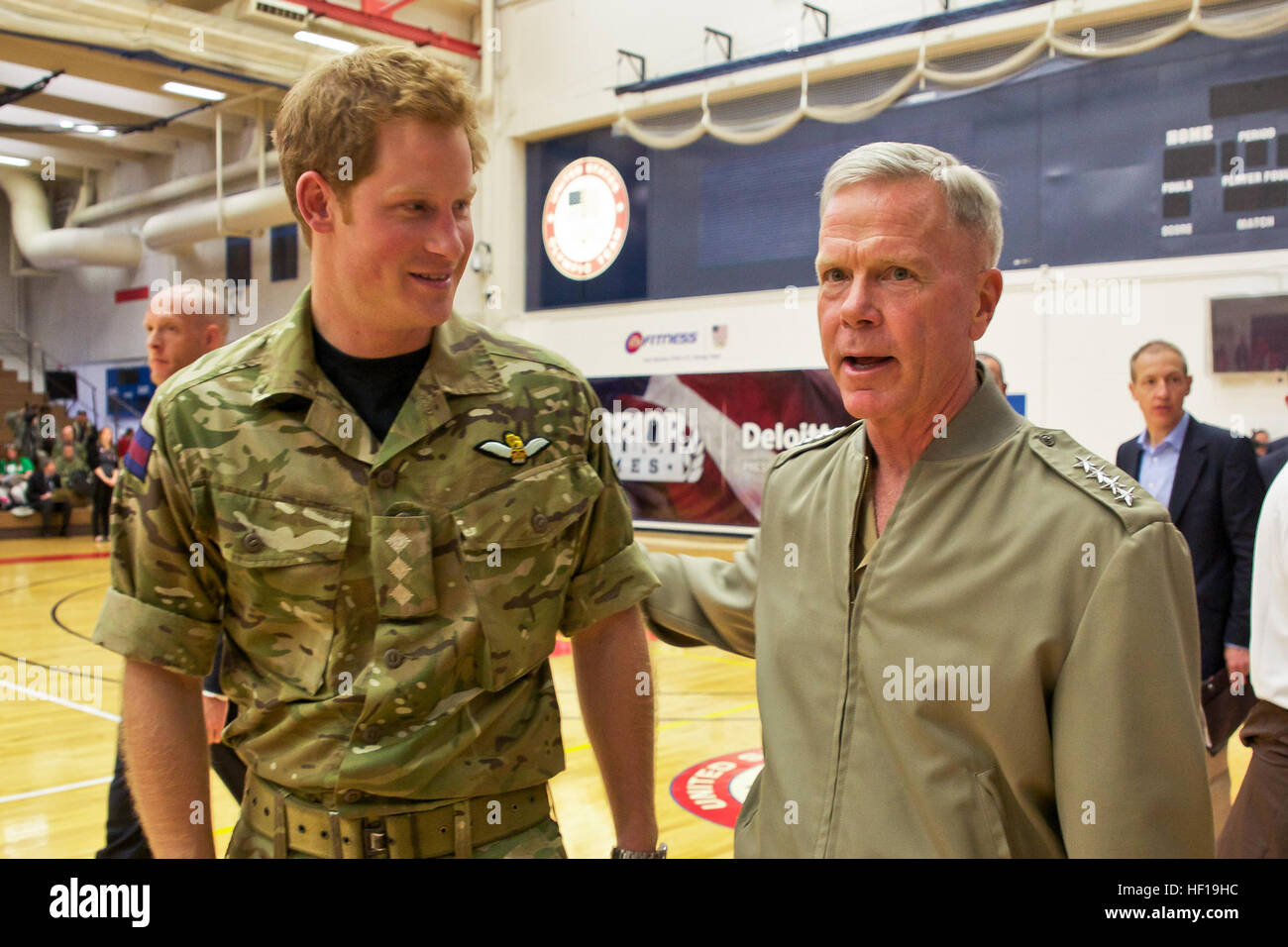 The 35th Commandant of the Marine Corps, Gen. James F. Amos, right, speaks with Prince Harry of Wales at the 2013 Wounded Warrior Games at the U.S. Olympic Training Center in Colorado Springs, CO., May 11, 2013. The Warrior Games, an annual event which is a partnership between the Department of Defense and U.S. Olympic Committee Paralympic Military Program, allows wounded, injured and ill athletes from all branches of the military to compete in organized sporting competitions. (U.S. Marine Corps photo by Sgt. Mallory S. VanderSchans/Released) Marine Corps commandant at 2013 Warrior Games 13051 Stock Photo