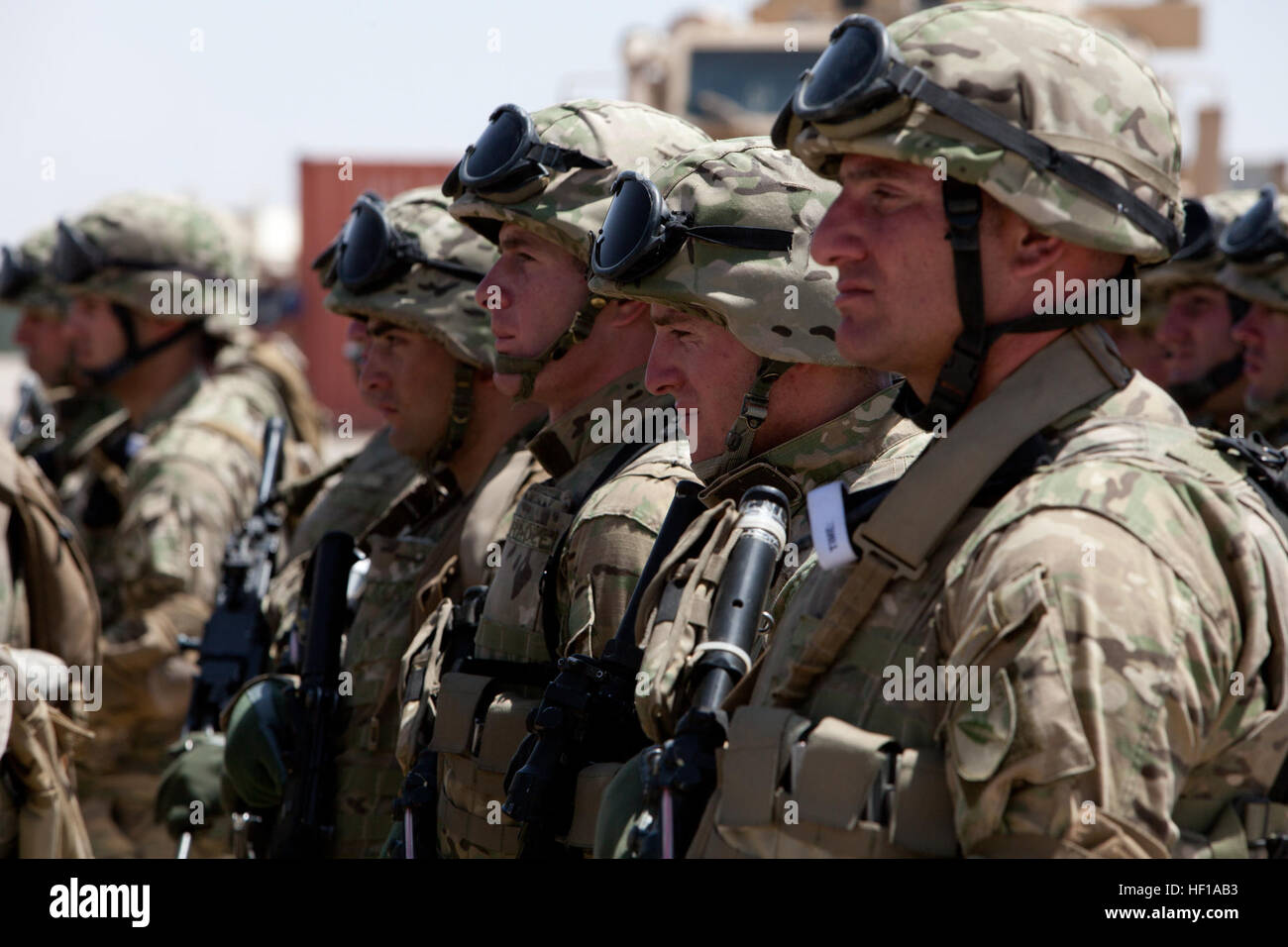 Georgian soldiers with the 42nd Battalion stand in formation during a Georgian independence day ceremony at Camp Leatherneck, Afghanistan, May 26, 2013. Mikheil Saakashvili, the president of Georgia, and other staff members traveled to the base to attend the ceremony. (DoD photo by Sgt. Tammy K. Hineline, U.S. Marine Corps/Released) 130526-M-RF397-140 (8890164721) Stock Photo