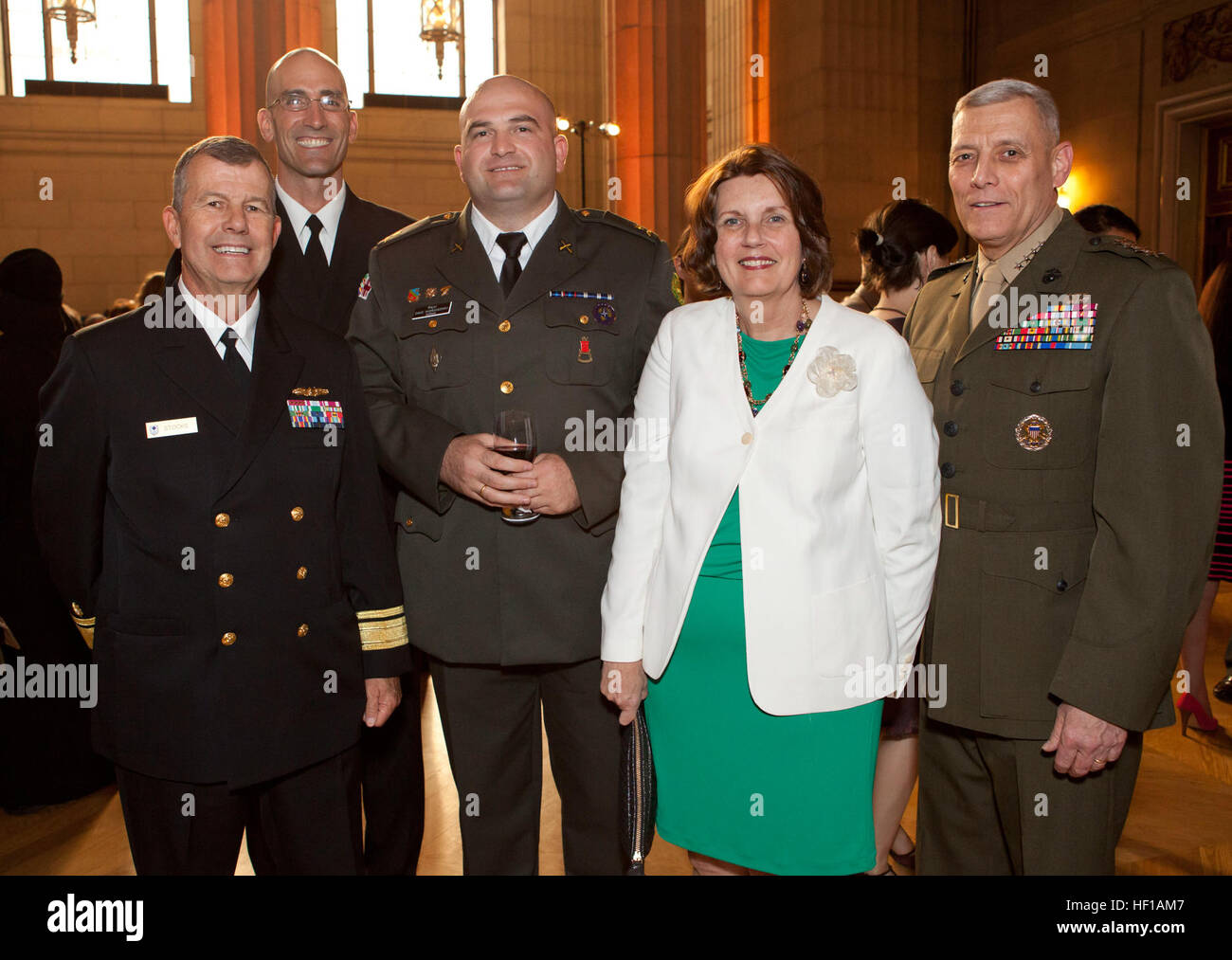 From left, U.S. Navy Rear Adm. Alton Stocks, the commander of Navy Medicine National Capital Area and the Walter Reed National Military Medical Center; Command Master Chief Terry J. Prince; Georgian army Maj. David Khorguashvili; Debbie Paxton; and Gen. John M. Paxton Jr., the assistant commandant of the Marine Corps, stand for a photo during a Georgian Independence Day celebration at the Andrew W. Mellon Auditorium in Washington, D.C., June 4, 2013. Georgia declared its independence May 26, 1918, in the midst of the Russian Civil War. (U.S. Marine Corps photo by Cpl. Tia Dufour/Released) Geor Stock Photo