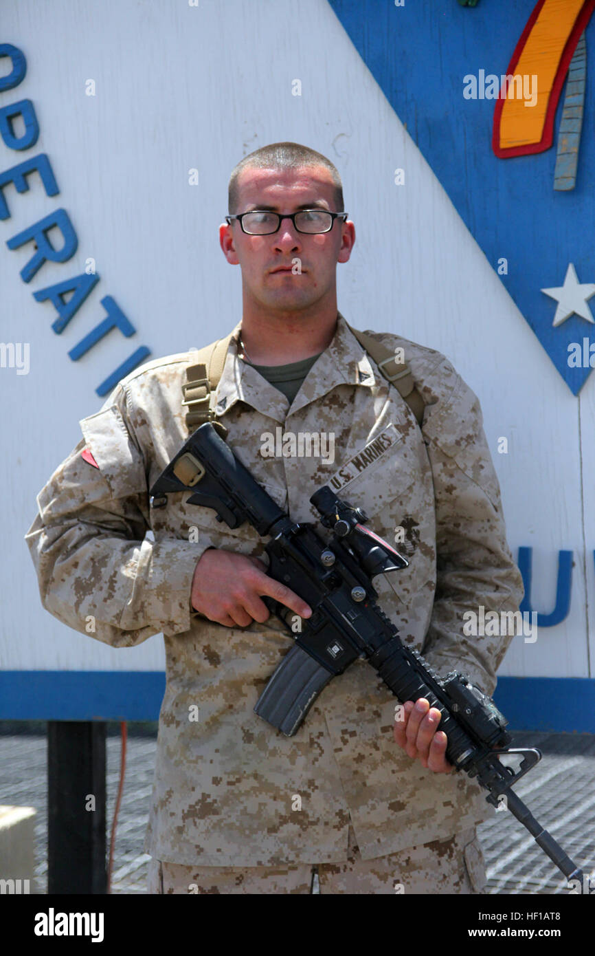 Lance Cpl. Matthew Friesen, a motor transportation operator with Regimental Combat Team 7, is a part of the motor transportation section responsible for moving gear and equipment throughout the RCT's area of operations. These logistics convoys supply Marines at smaller bases with water, food and other necessary military supplies. Friesen, a 21-year-old native of Ellicott City, Md., is one of many in his family to serve in the military and is proud to continue the tradition. Friesen's father served in the Navy, and his grandfathers served in the Army and Marine Corps. Ellicott City, Md., Marine Stock Photo