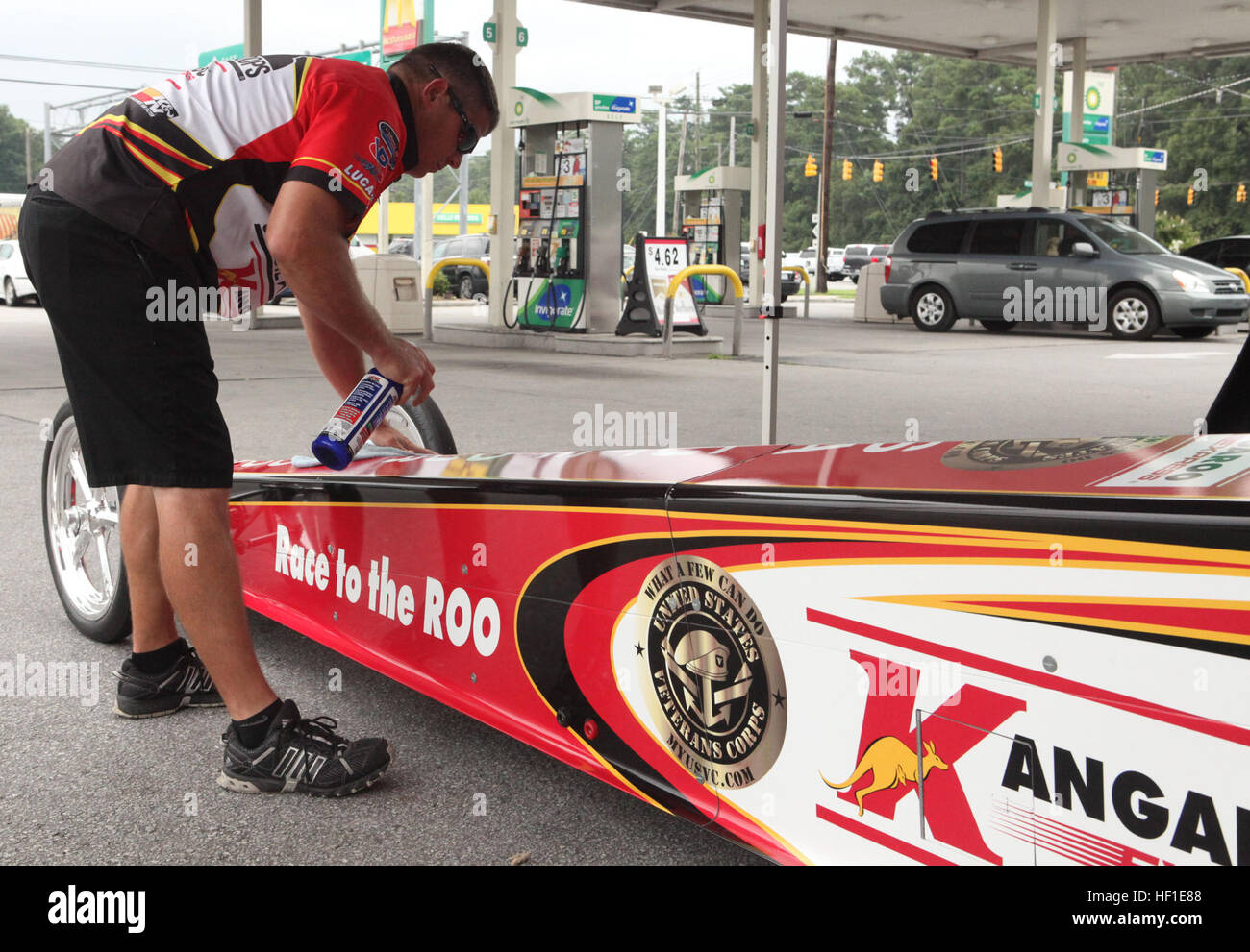 Don O'Neal, retired Army soldier and drag racer, cleans his dragster ...