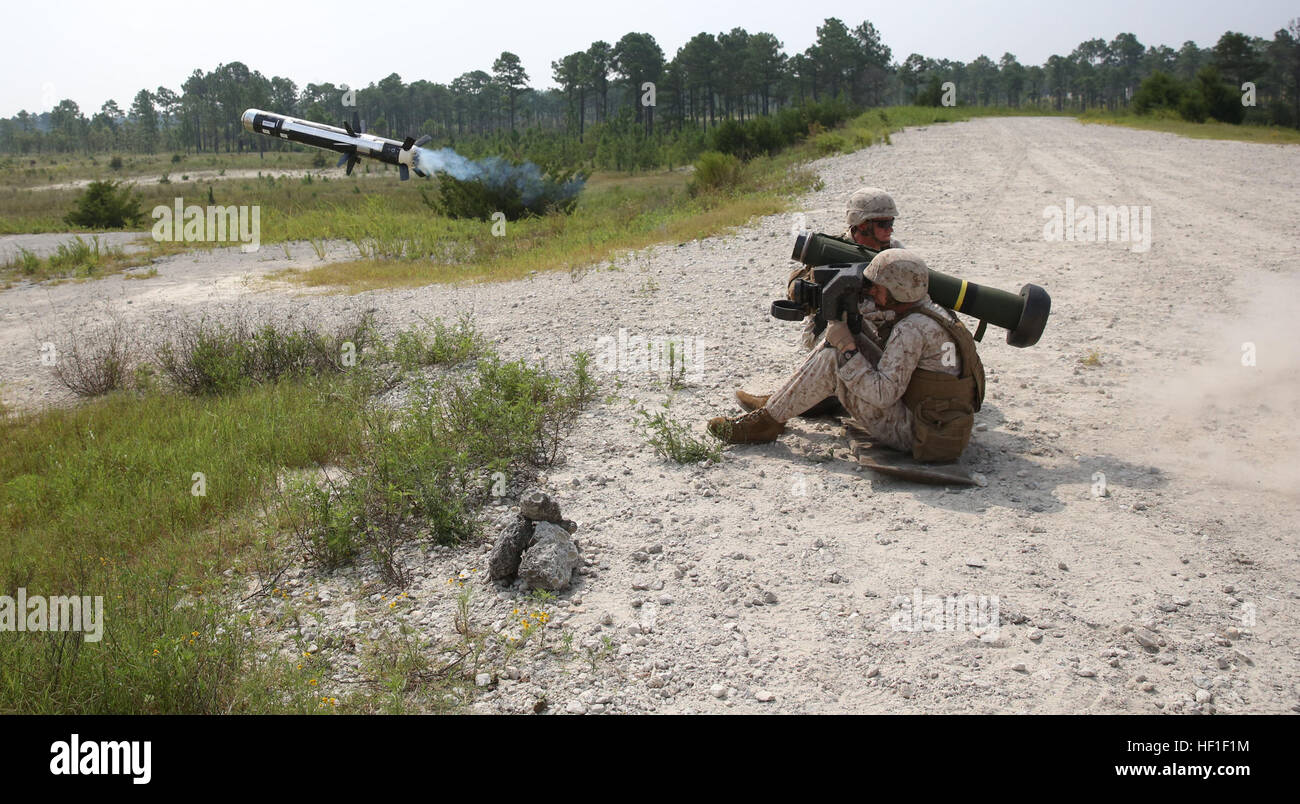 Anti-tank Missilemen with 2nd Battalion, 9th Marine Regiment, fire the FGM-148 Javelin weapon system in a live fire training exercise, August 29, 2013. Firing the Javelin is Sgt. Patrick Harrington an Anti-Tank Missileman with 2nd Battalion 9th Marines, and his assistant gunner is Sgt. Michael Lesiewicz, an Anti-Tank Missileman with 2nd Battalion 9th Marines. Marines take rare chance to fire missiles 130829-M-WI309-009 Stock Photo