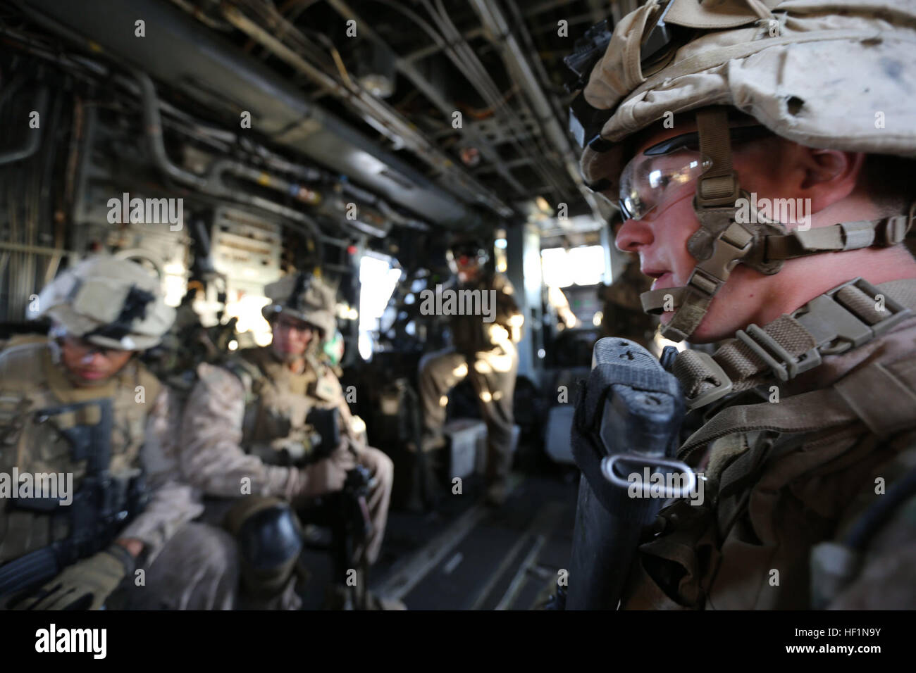 U.S. Marines with Bravo Company, 1st Battalion, 9th Marines Regiment are transported by a CH-53 Super Stallion during a raid exercise over Helmand province, Afghanistan, Oct. 8, 2013. The training was conducted to simulate a raid on an enemy compound. (U.S. Marine Corps Photo by Lance Cpl. Zachery B. Martin/Released) 1-9 Conducts a Training Raid 131008-M-WA264-007 Stock Photo