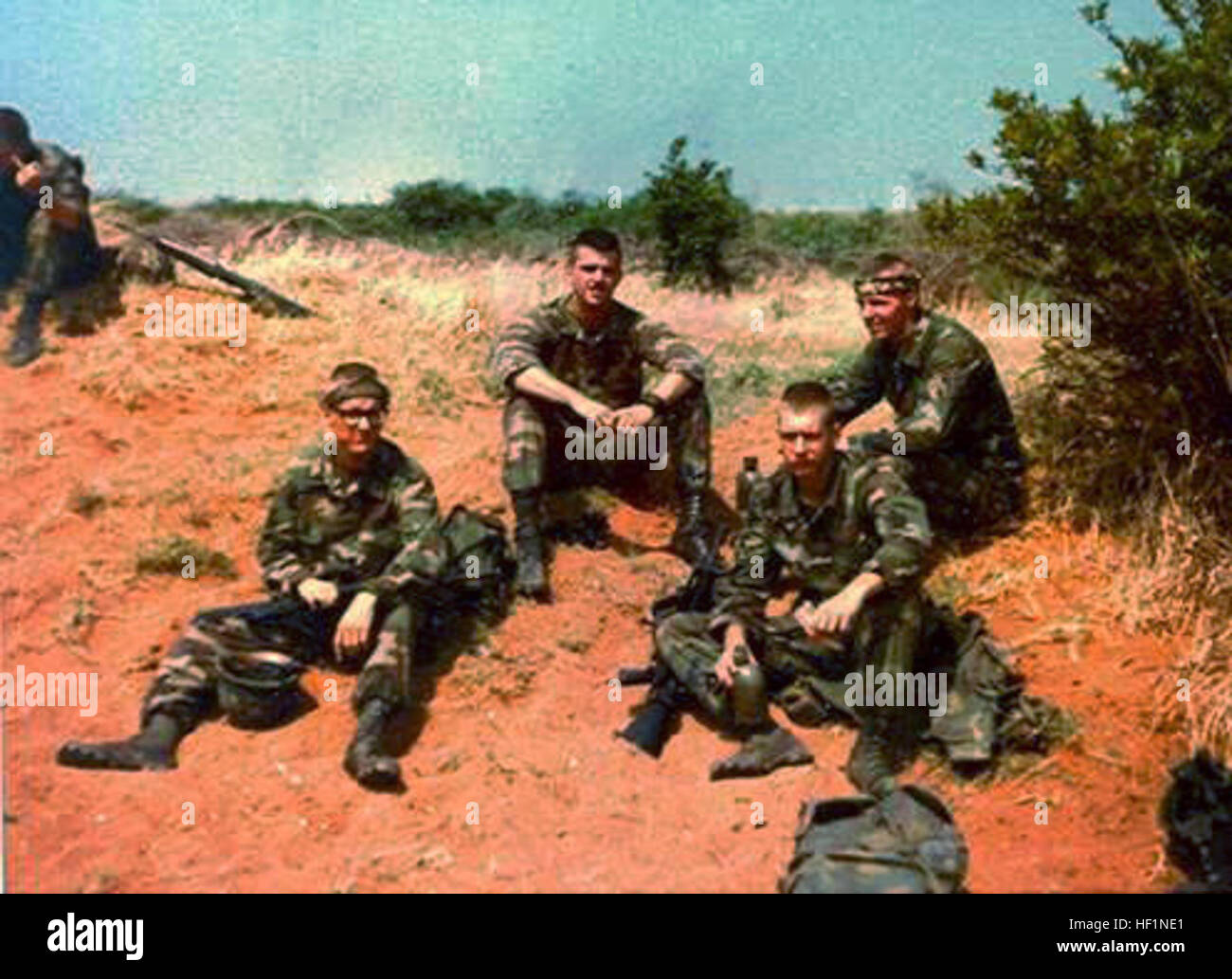 Brian Kirkpatrick (far left), a combat engineer attached to the 'C' Company, 1st Battalion, 8th Marines, 24th Marine Amphibious Unit, sits with Marines from his squad during peacekeeping operations in Beirut, Lebanon, in 1983. Kirkpatrick is a survivor of the 1983 Marine Barracks bombing in Beirut, Lebanon. On Oct. 23,1983, a suicide bomber driving a truck rammed into the barracks with 12,000 pounds of high explosives detonating one of the largest non-nuclear bombings in history. Remembering Beirut 131011-M-ZZ999-010 Stock Photo
