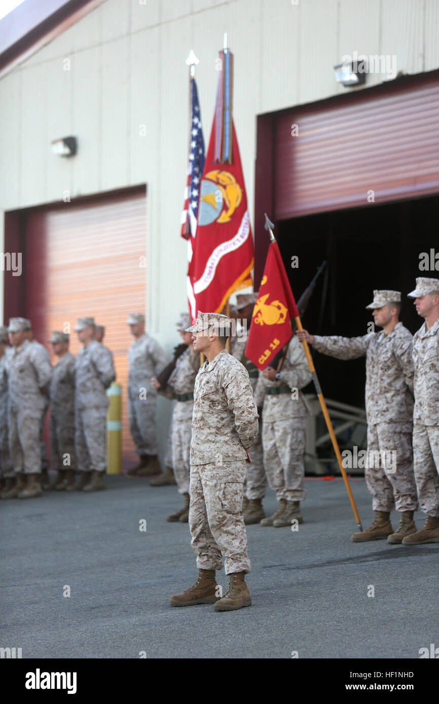 Marines with Combat Logistics Battalion 15, Combat Logistics Regiment 17, 1st Marine Logistics Group, stand in formation with the battalion's battle colors during CLB-15's birthday ceremony aboard Camp Pendleton, Calif., Oct. 15, 2013. The battalion was activated Oct. 15, 1987, and provides its logistical capabilities to the 15th Marine Expeditionary Unit, supporting it in various conventional and special maritime operations throughout the globe.  (U.S. Marine Corps photo by Lance Cpl. Shaltiel Dominguez/ Released) CLB-15 celebrates unitE28099s 26th birthday 131015-M-SD123-002 Stock Photo