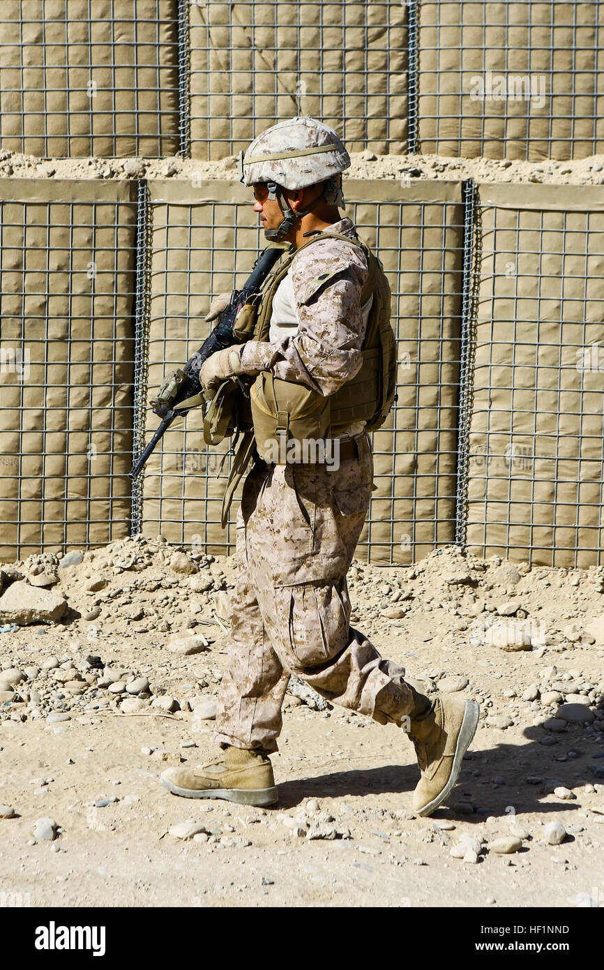 U.S. Marine Corps Sgt. Maj. Rafael Rodriguez, the battalion sergeant major of the 3rd Battalion, 7th Marine Regiment, patrols in Lashkar Gah, Helmand province, Afghanistan, Oct. 17, 2013. Rodriguez traveled to the area to visit with Marines assigned to security force advise and assist teams. (DoD photo by Lance Cpl. Sean Searfus, U.S. Marine Corps/Released) 131017-M-VH365-016 (10422420654) Stock Photo