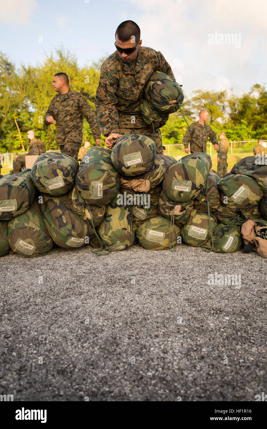 Marines unload cargo at Tinian's International airport Nov. 6, 2013 ...