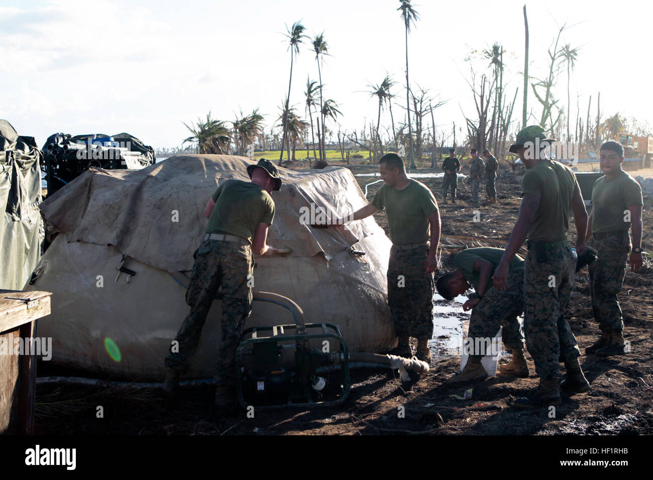 Marines maintain a tactical water purification system Nov. 18 at