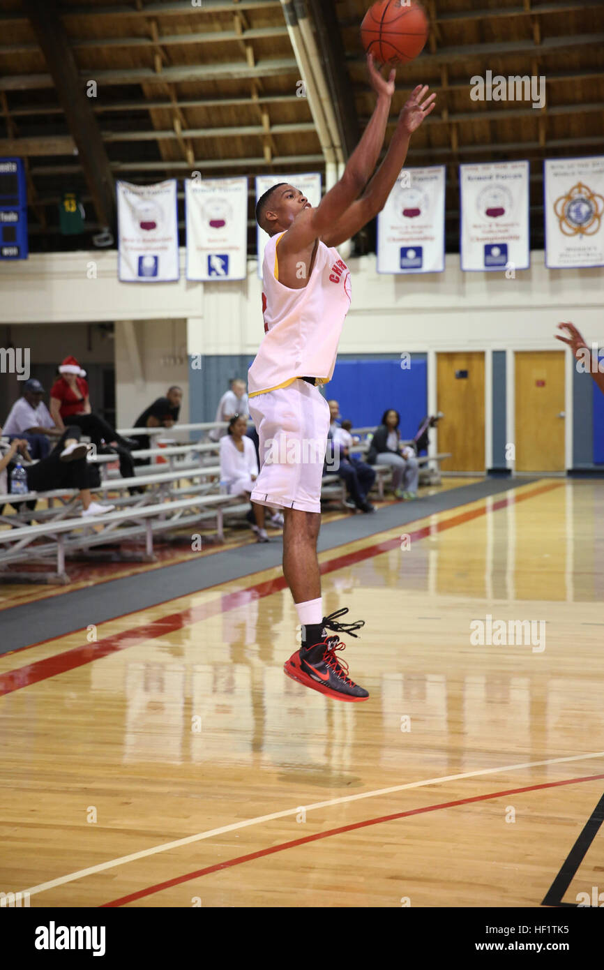 Day Walkers' forward Vernty Bryant attempts a three pointer during the