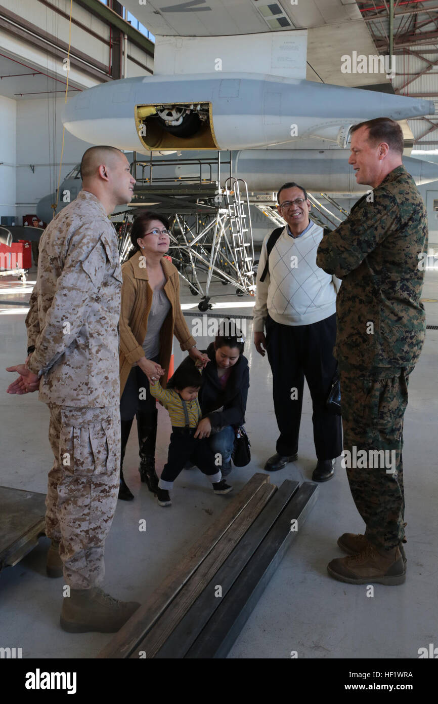 U.S. Marine Corps Brig. Gen. Mark R. Wise, assistant wing commander, 3rd Marine Aircraft Wing (MAW), speaks with Sgt. Von C. Surriga of Marine Aerial Refueler Transport Squadron (VMGR) 352, Marine Aircraft Group (MAG) 11, 3rd MAW, on Marine Corps Air Station Miramar, Calif., Jan. 15, 2014. Surriga deployed with VMGR-352 in support of Operation Enduring Freedom. (U.S. Marine Corps photo by Lance Cpl. Allison J. Herman, 3rd MAW Combat Camera/Released) VMGR-352 Bids Farewell Before Leaving on Deployment 140115-M-DF987-047 Stock Photo