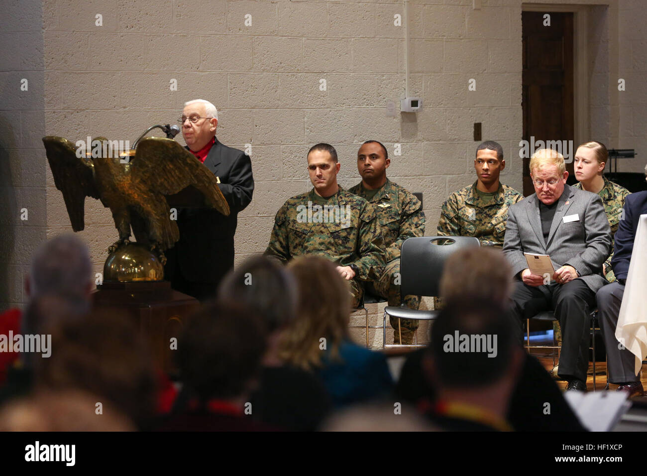 The president of the 2nd Marine Division Association, retired Gunnery Sgt. Mike Piserchia,  speaks to past and present Marines and sailors of 2nd Marine Division during the memorial service held for the 2nd Marine Division's 73rd birthday aboard Marine Corps Base Camp Lejeune Jan. 31, 2014. Past and present Marines of 2nd Marine Division joined to celebrate the Division's 73rd birthday. The 2nd Marine Division's history of service ranges from the battle of Guadalcanal during World War II to fighting the Global War on Terrorism in Operations Iraqi and Enduring Freedom. E28098Old CorpsE28099, E2 Stock Photo