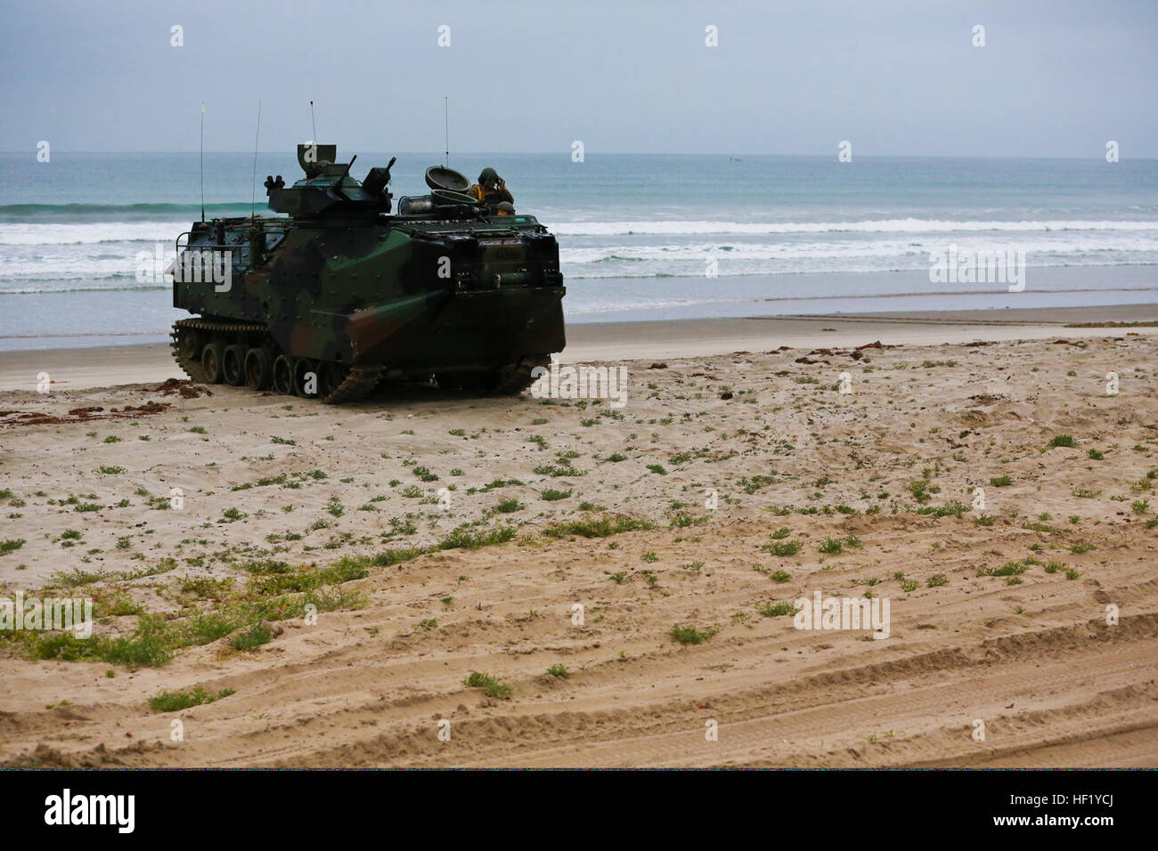 A U.S. Marine Corps AAV-7A1 assault amphibious vehicle performs an amphibious landing at Marine Corps Base Camp Pendleton, Calif., Feb. 19, 2014, as part of exercise Iron Fist 2014. Iron Fist is a three-week bilateral training event held annually between the U.S. Marine Corps and the Japan Ground Self-Defense Force designed to increase interoperability between the two services while aiding the Japanese in their continued development of amphibious capabilities. (U.S. Marine Corps photo by Lance Cpl. Ricardo Hurtado/Released) A U.S. Marine Corps AAV-7A1 assault amphibious vehicle performs an amp Stock Photo