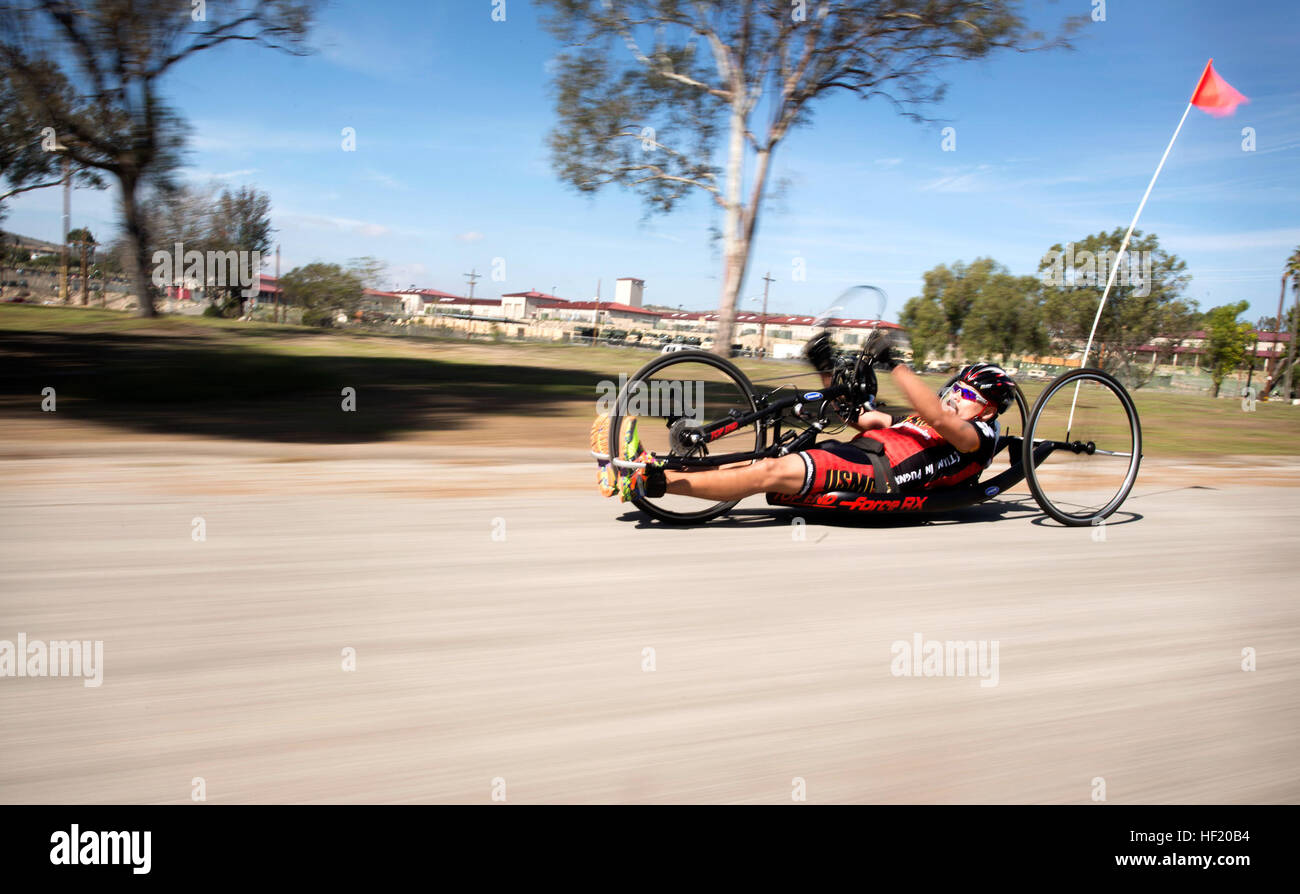 Marine veteran Ronnie Jimenez rides his recumbent bike during cycling