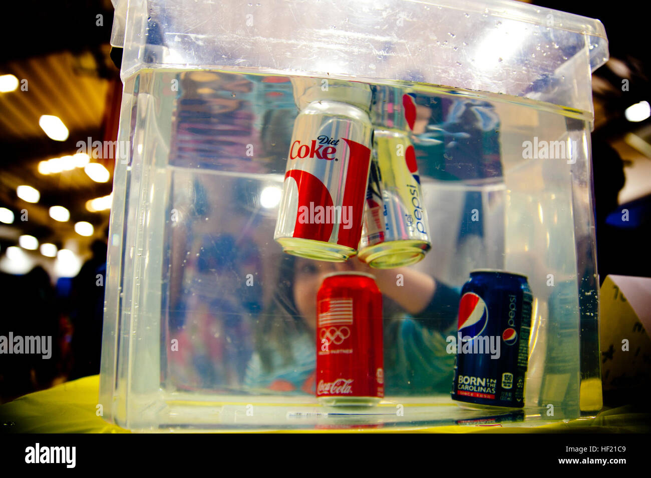 A young visitor to a science fair in Jacksonville, N.C., peers into a