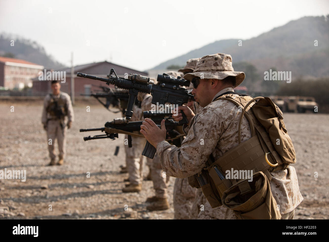 U.S. Marines with Apache Company, 3rd Light Armored Reconnaissance Battalion, 1st Marine Division participate in a combat marksmanship course March 27, 2014, at Suesongri Range in Pohang, South Korea, during exercise Ssang Yong 2014. Ssang Yong is a combined U.S.-South Korean combat readiness and joint/combined interoperability exercise designed to advance South Korean command and control capabilities through amphibious operations. (DoD photo by Lance Cpl. Andrew M. Blanco, U.S. Marine Corps/Released) 140327-M-MO123-001 (13464841804) Stock Photo