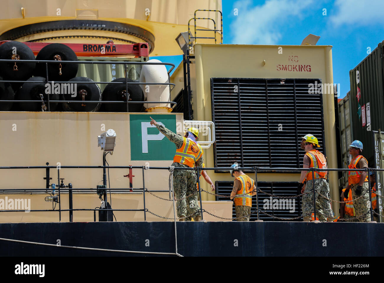 Members of the U.S. Navy organize and initiate the offloading of Marine Rotational Force - Darwin gear from the USNS 2nd Lt. John P. Bobo while members of the Marine Corps and Australian Defence Force begin transporting it to Robertson Barracks and Royal Australian Air Force's Base Darwin, March 31. As of early April, MRF-D will be at full capacity, wasting no time to begin the six-month rotation alongside the ADF and Darwin community for the extent of the Dry Season. Marines offload MRF-D gear off of USNS 2nd Lt. John P. Bobo 140331-M-SE196-004 Stock Photo