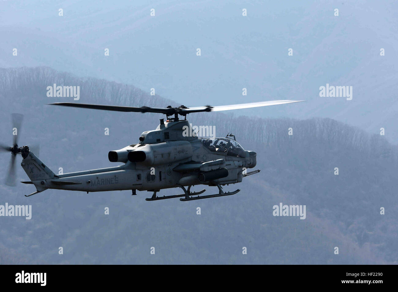 POHANG, SOUTH KOREA (April 1, 2014) – A U.S. Marine Corps AH-1Z Super Cobra assigned to 13th Marine Expeditionary Unit conducts flight operations during Ssang Yong 14 in Pohang, South Korea, April 1, 2014.  Exercise Ssang Yong is conducted annually in the Republic of Korea (ROK) to enhance the interoperability of U.S. and ROK forces by performing a full spectrum of amphibious operations while showcasing sea-based power projection in the Pacific. (Official U.S. Marine Corps photo by Cpl. David Gonzalez/Released) Ssang Yong 140401-M-IO267-154 Stock Photo