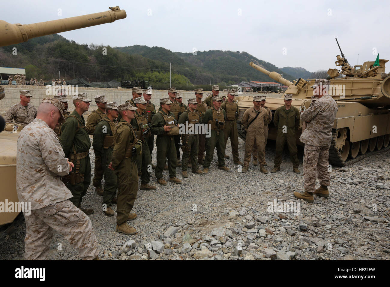 Maj. Gen. James S. Hartsell, Commanding General of 4th Marine Division, gives encouraging words to Marines with Charlie Company, 4th Tanks Battalion, participating in exercise Ssang Yong, Pohang, South Korea,  April 3, 2014. Exercise Ssang Yong is conducted annually in the ROK to enhance interoperability between U.S. and ROK forces by performing a full spectrum of amphibious operations while showcasing sea-based power projection in the Pacific. (U.S. Marine Corps photo by Cpl. Lauren Whitney/Released) 4th Marine Division leaders visit, Ssang Yong 14 140403-M-GZ082-041 Stock Photo