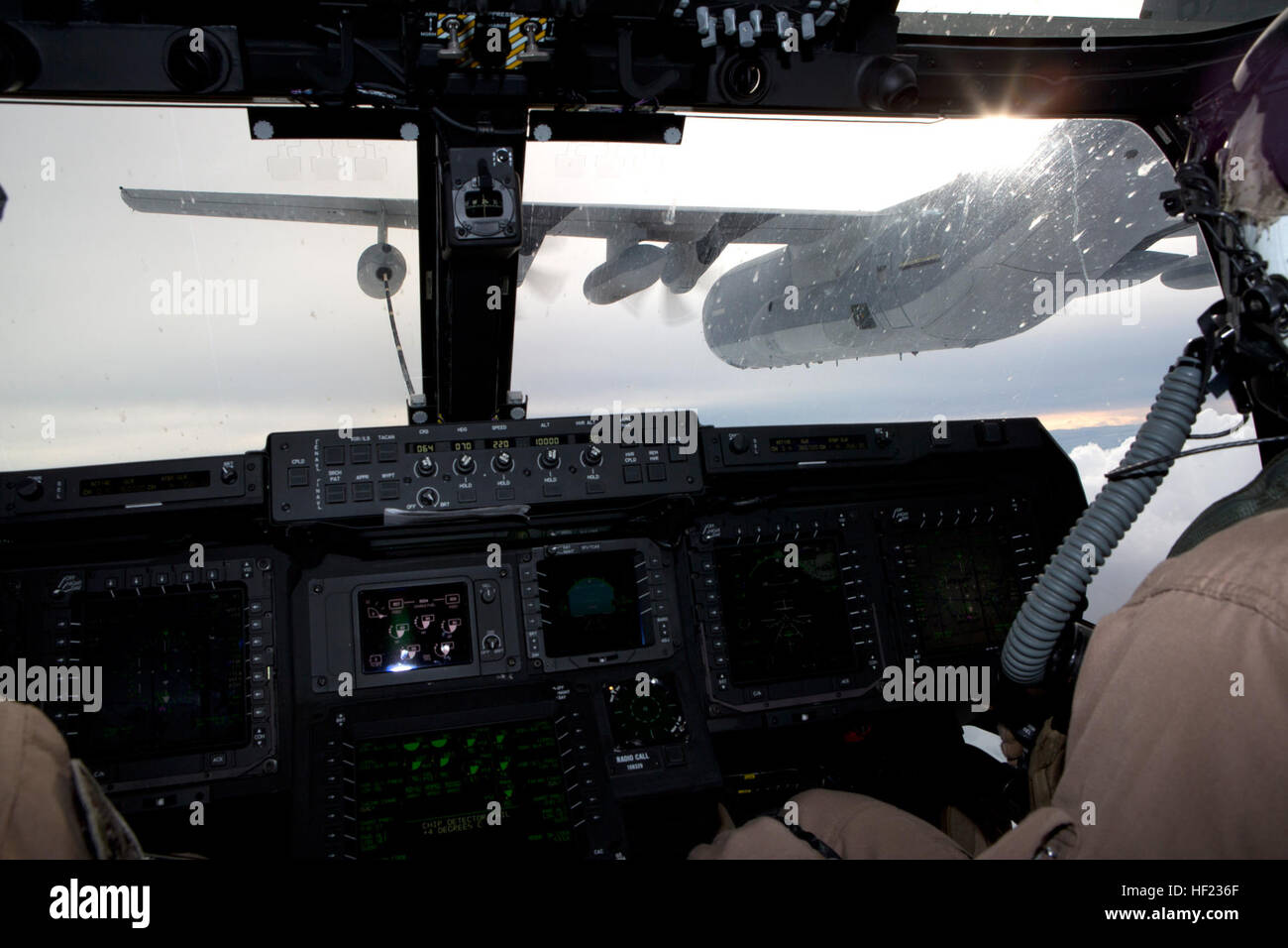 U.S. Marine Corps Capt. Christopher S. Odom, a pilot with Marine Medium Tiltrotor Squadron (VMM) 266, closes with a KC-130J Hercules aircraft assigned to Marine Aerial Refueler Transport Squadron (VMGR) 252, over the Atlantic Ocean, off the coast of N.C., April 14, 2014. Odom refeuled an MV-22 Osprey aircraft from the KC-130J. (U.S. Marine Corps photo by Lance Cpl. Jodson B. Graves/Released) VMGR-252, VMM-264 and 266 Aerial Refuelinng Training Exercise 140414-M-SW506-152 Stock Photo