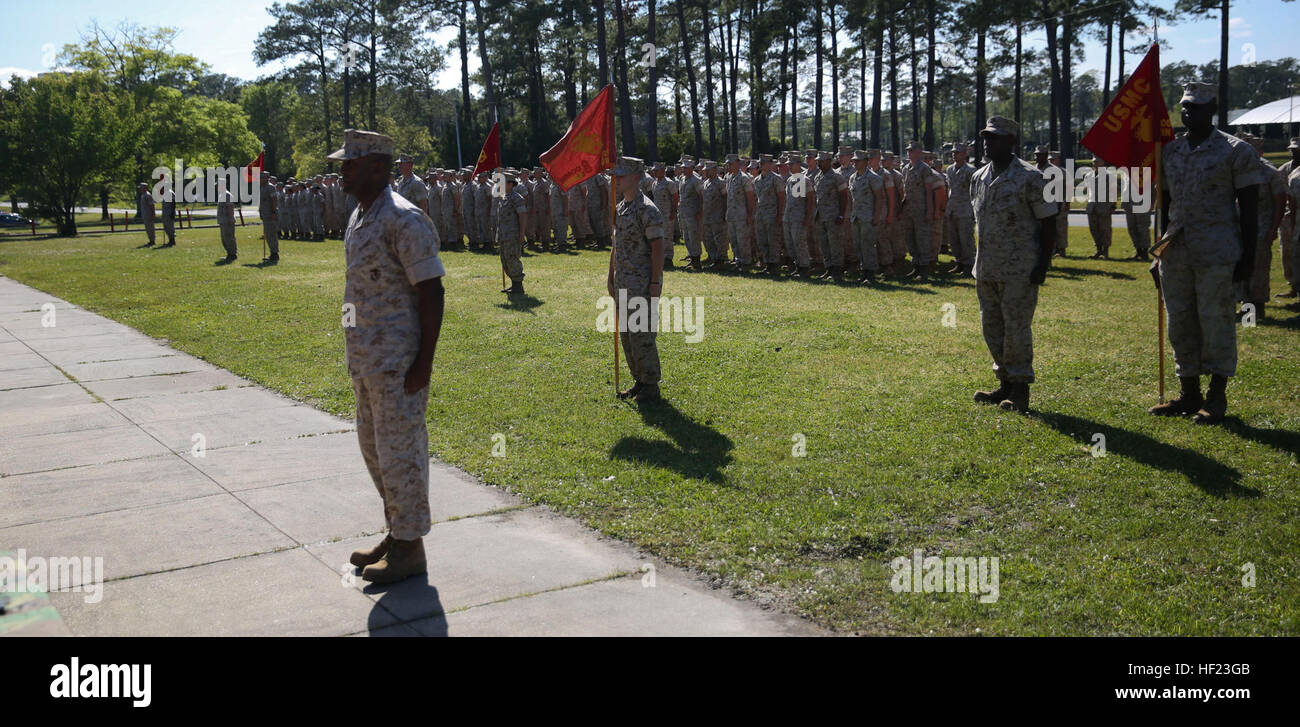 Eighth Communcation battalion Marines stands at attention as they recieve the Chesty Puller award in the large unit category at Marine Corps Base Camp Lejeune; April 22; 2014. The award recognizes one unit annually in the large, medium, and small categories for demostrating superior performance. Eighth Communication Battalion, 2nd ANGLICO receive Chesty Puller Award 140421-M-SF718-064 Stock Photo